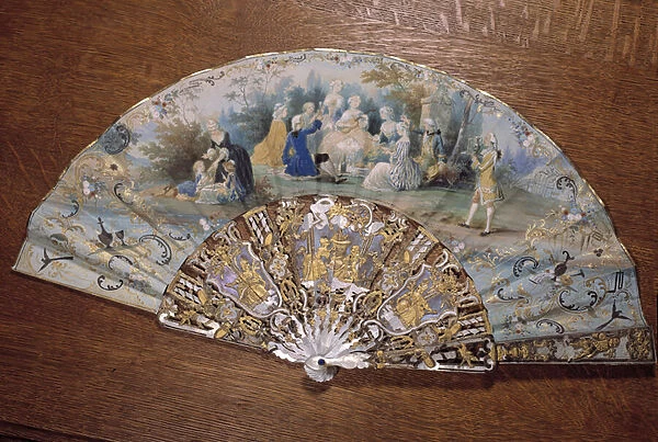 Fan representing a country taste. A group of noble picnic in a park