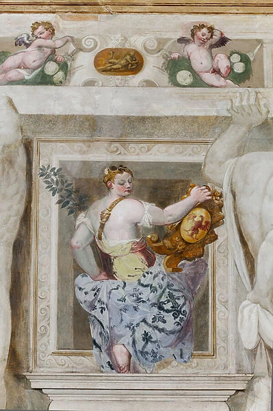 Fetail of a female figure holding the heraldic coat of arms of the Caldogno family. Main Hall, c. 1570 (fresco)
