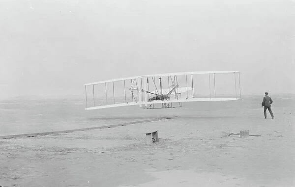 First flight, Kitty Hawk, North Carolina, 120 feet in 12 seconds, 10. 35am December 17th 1903 (b  /  w photo)