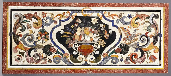 A Florentine pietra dura table top centred by a bowl of fruit and flowers (pietra dura)