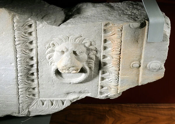 Part of a folding tomb entrance door with head of a lion, from Greece