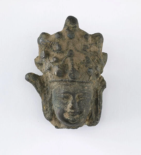 Fragment: head of a deity (bronze)