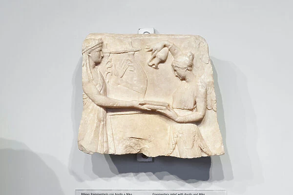 Fragmentary relief with Apollo and Nike (pentelic marble)
