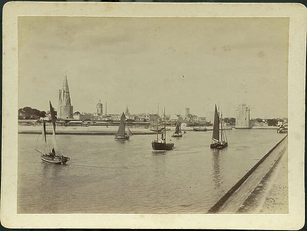 France, Poitou-Charentes, Charente-Maritime (17), La Rochelle: The entrance to the port of La Rochelle with fishing boats returning to the port, 1885