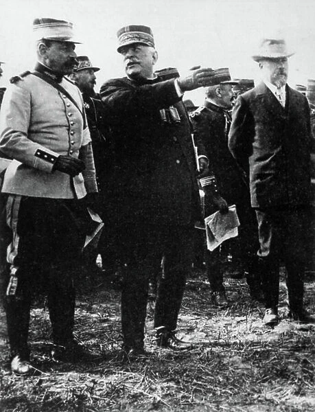 French president Raymond Poincare (l) with general Joseph Joffre (c) on the front looking at manoeuvres of French army in Toulouse, 1913