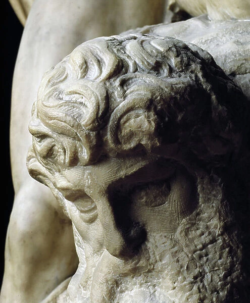 The Genie of Victory. Detail of an unfinished head. Project for the tomb of Pope Julius II. Renaissance marble sculpture made by Michelangelo Buonarroti known as Michelangelo (Michelangelo or Michelangelo, 1475-1564), 1527-28