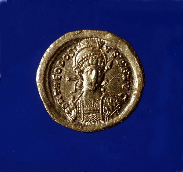 Gold coin with the effigy of the Byzantine Emperor Theodosius II (401 - 450)