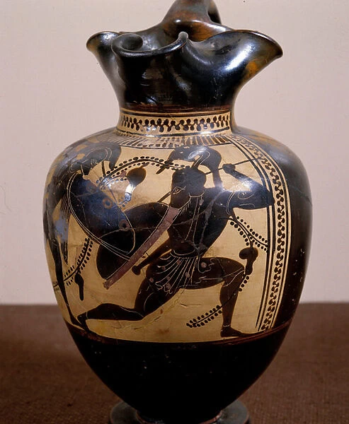 Greek antiquite: black vase with a warrior