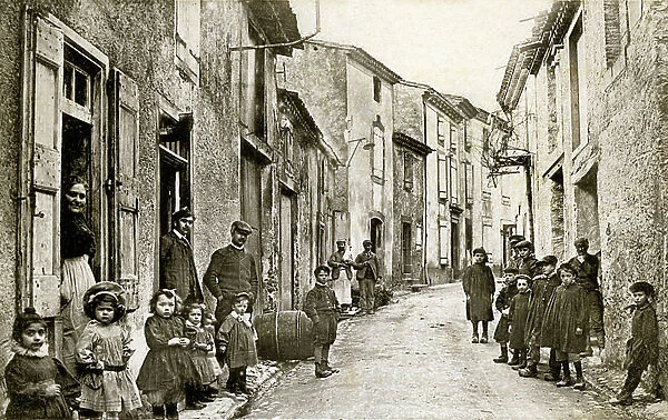 Group of children on a street in the village of Fonties d'Aude, early 20th century (b / w photo)