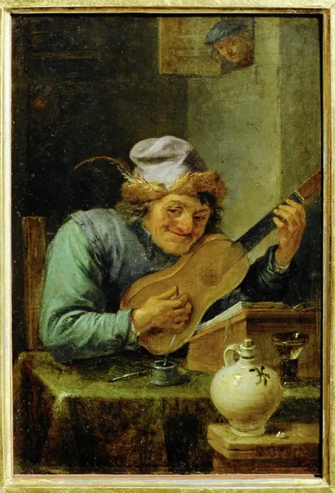 Framed Print : The guitar player
