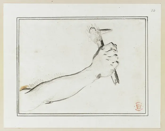 Framed Print : A hand holding an implement