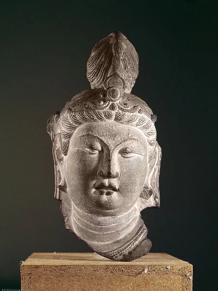 Head of a Bodhisattva, Tang Dynasty (618-907), c. 710 (sandstone & pigment)