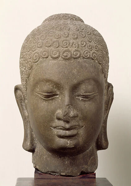 Head of Buddha, from Vat Romlok, Angkot Borei, 6th-7th century (sandstone)