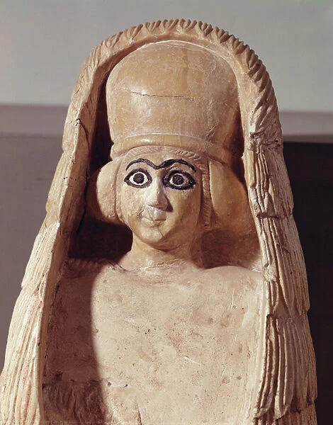Head of a statue of Ishtar, wearing a headdress, from the Temple of Ushtar at Mari
