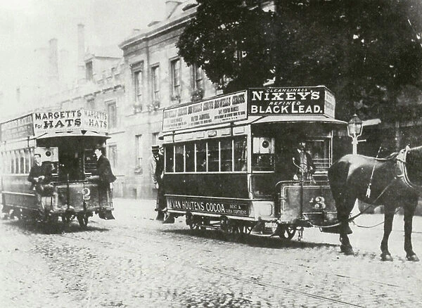 Horse-drawn tram outside All Souls College, the High, Oxford, late 19th century. (b / w photo)