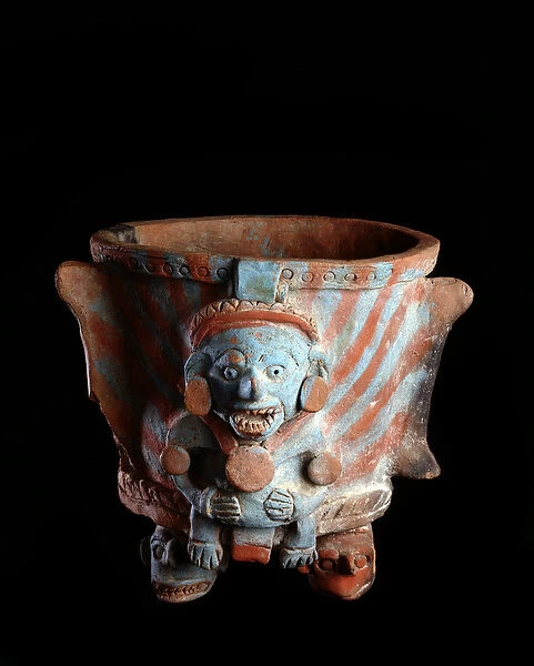Incense tripod vase, decorated with a head, 600 to 1200 AD (clay)