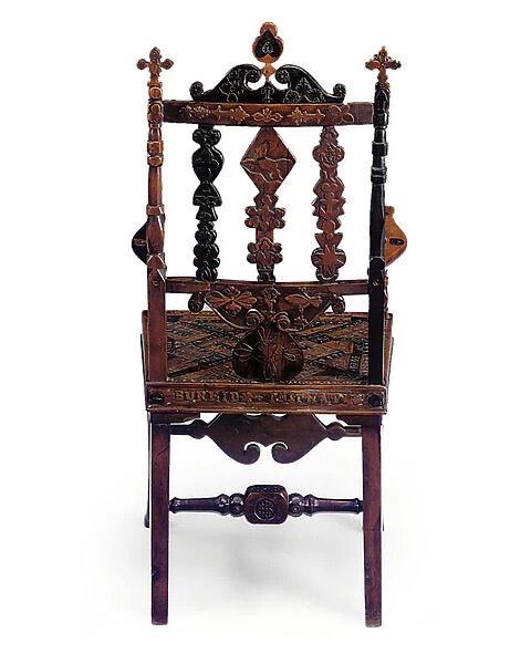Inlaid and carved open armchair encoded with a patchwork of various phrases