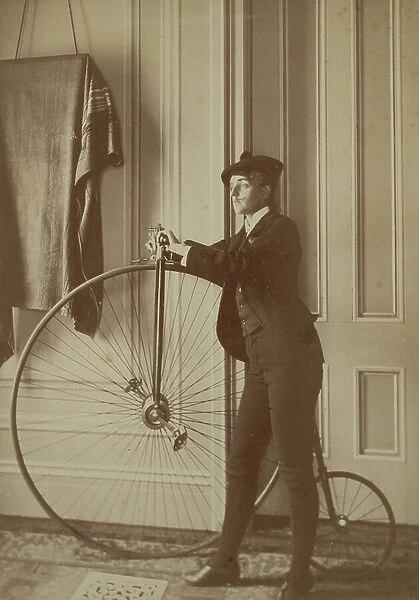 Inside the house with a Penny Farthing Bicycle, c. 1890 (sepia photo)