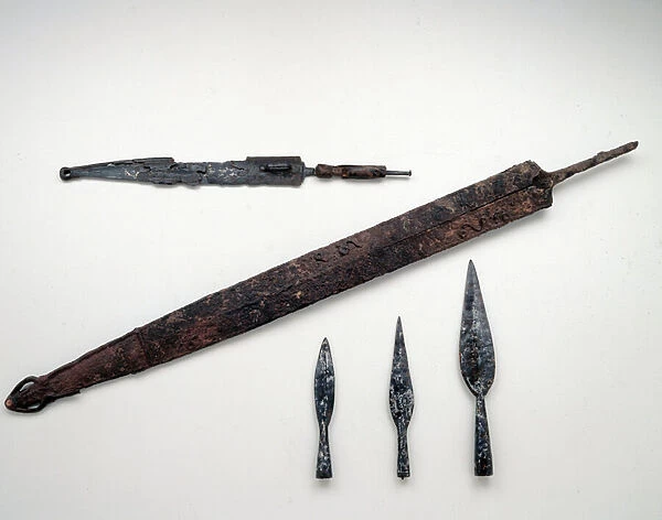 Iron spades and spear tips. 5th century BC