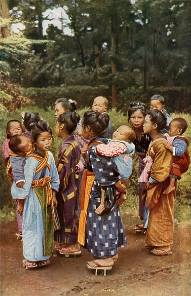 Japanese girls carrying babies on their backs (colour photo)