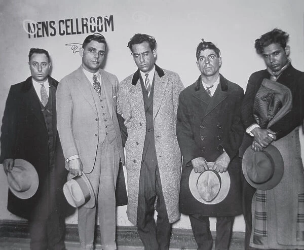 Joe Aiello (1891-1930) with his henchmen in police custody, 1928 (b / w photo)