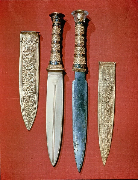The kings two daggers, from the tomb of Tutankhamun (c