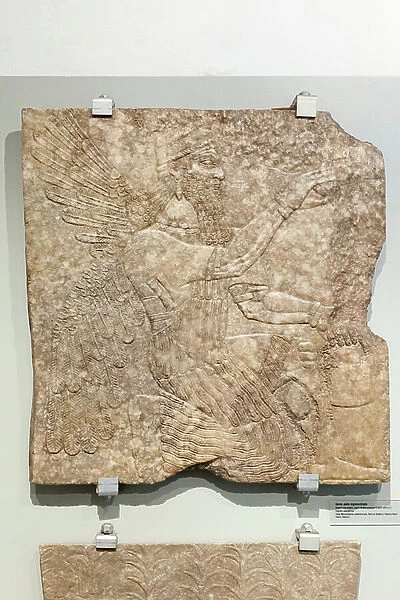 Kneeling winged deity, Neo Assyrian Empire, reign of Ashurnasirpal II (alabastrine limestone)