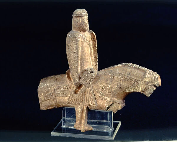 Knight on horseback, left profile (bone) (see also 219607)
