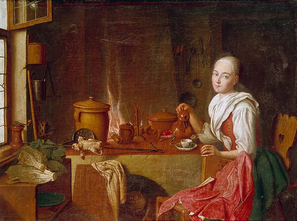 Lady in her kitchen A young woman sitting on a coffee in front of the fire place