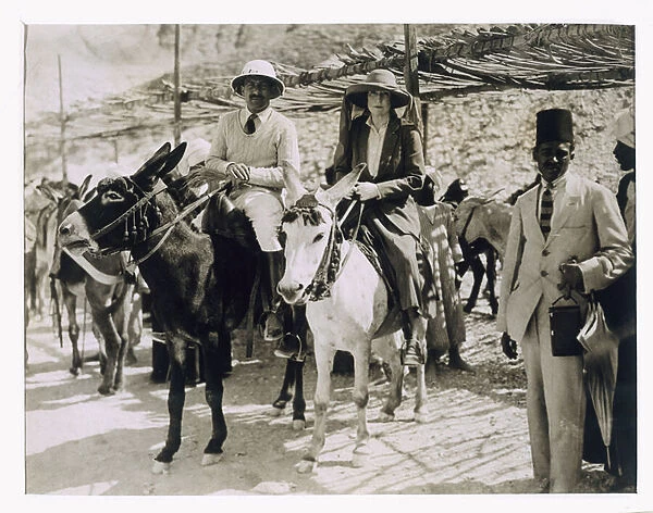 Lady Ribblesdale and Mr Stephen Vlasto arriving on donkeys at the Tomb of Tutankhamun, Valley of the Kings, 1922 (gelatin silver print)