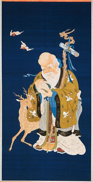 A large kesi hanging scroll depicting Shoulao holding a peach
