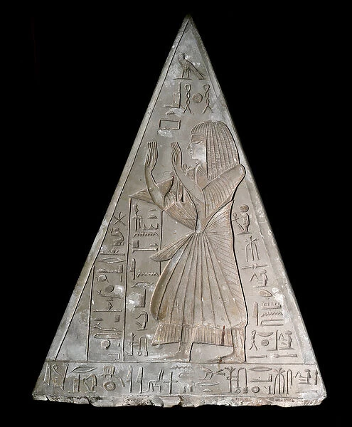 The late worshiping Re-Atum, deity of the setting sun. 19th dynasty ((1295-1190 BC