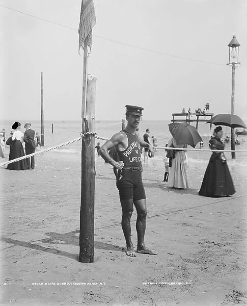 A Life guard on Brighton Beach, Brooklyn, New York, 1901-06 (b  /  w photo)
