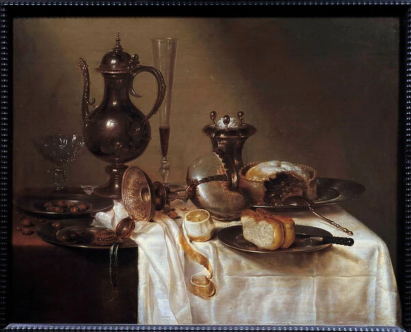 Still life at the nautile Table covered with silverware, a bread, a wine flute
