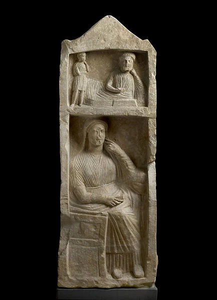 Limestone tomb stele, relief of a bearded banqueter with boy attendant and a seated woman