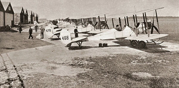 A line up of planes of the Royal Flying Corps which went into action in 1914. From The Story of 25 Eventful Years in Pictures published 1935