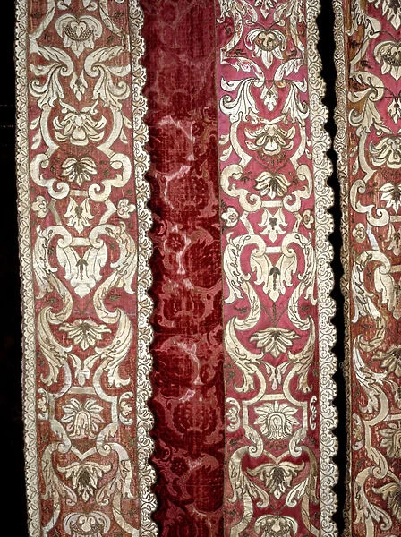 Louis XIII style: detail of a four-poster bed in velvet