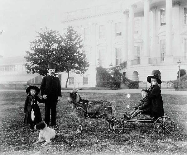Major Russell Harrison outside the White House playing with his children