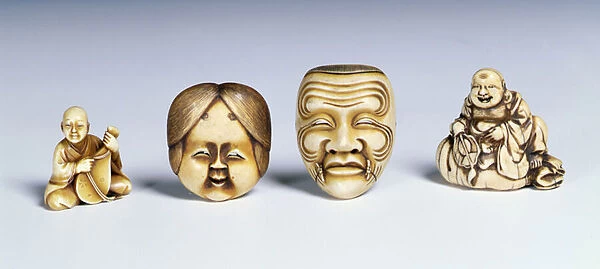 Two masks and two musicians (ivory)