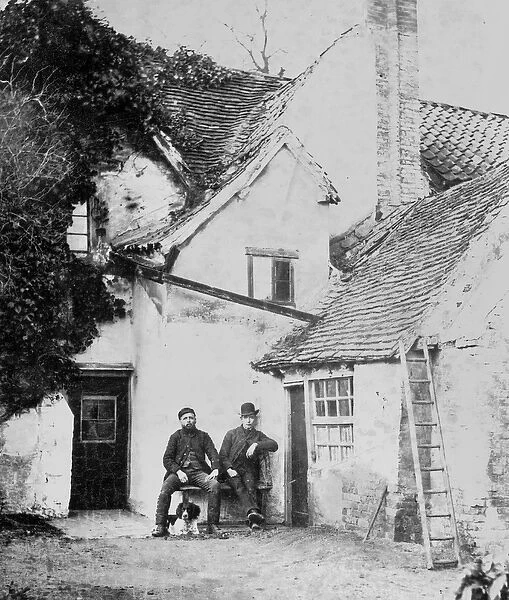 Two men outside Enfield cottage, c. 1890 (b  /  w photo)