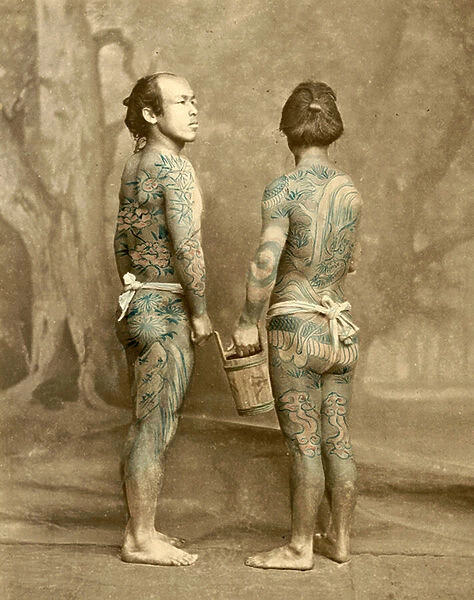 Two men with traditional Japanese Irezumi tattoos, c. 1880 (hand coloured albumen photo)
