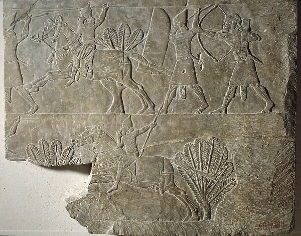 Mesopotamia: Horsemen of the Assyrian army. Low relief in albaster from the palace of