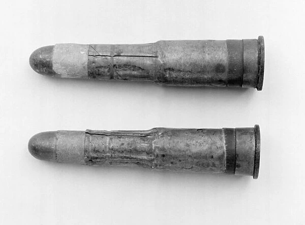 Two Mk III. 45 in live Martini-Henry rifle small arm ball cartridges, c. 1875 (metal)