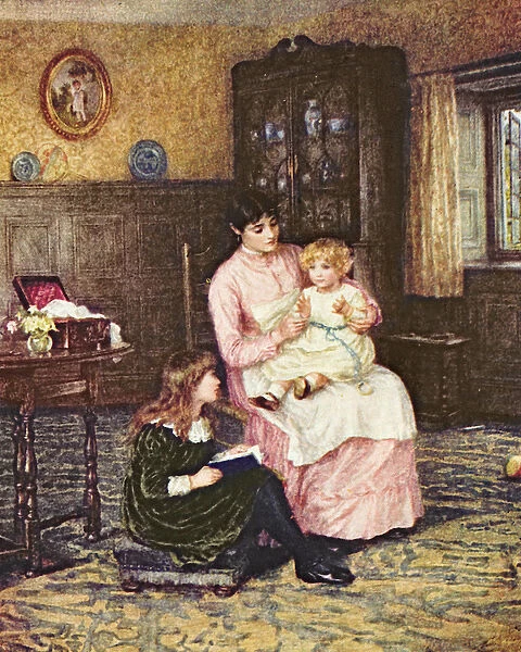 Mother playing with children in an interior