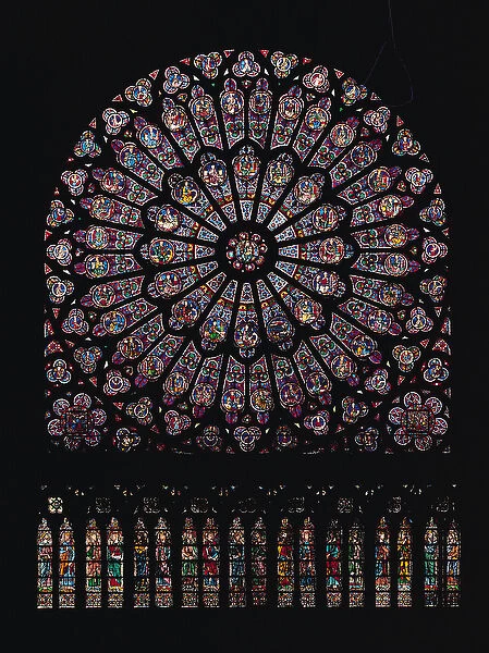 North transept rose window depicting the Virgin and Child in the centre surrounded by Old