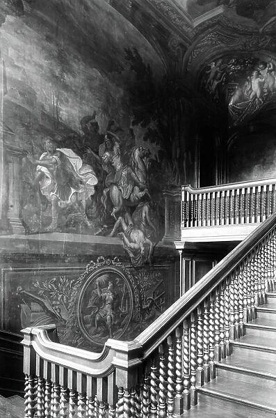 The north wall of the staircase at Stoke Edith Park, Herefordshire, from England's Lost Houses by Giles Worsley (1961-2006) published 2002 (b / w photo)