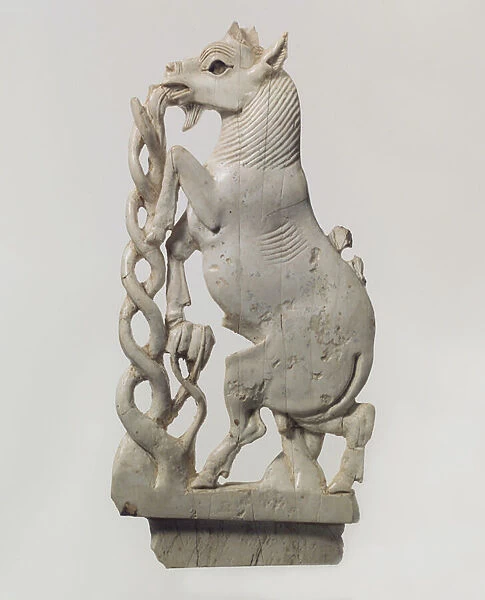 Openwork furniture plaque with a rearing goat, c. 9th-8th century B. C. (ivory)