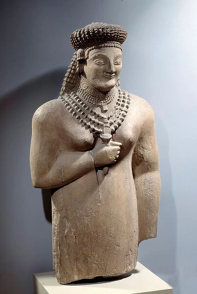 Oriental antiquite: limestone statue of woman with jewels. from Tricomo (Cyprus)