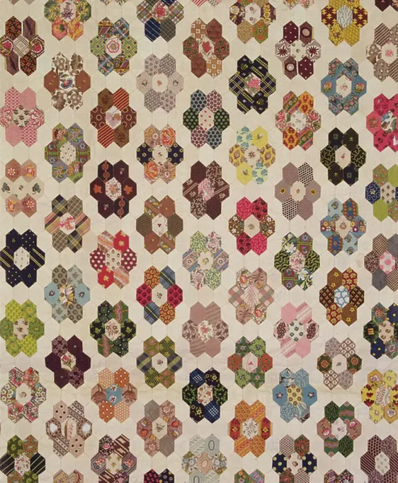 Framed Print : Detail of a patchwork bedcover (textile)