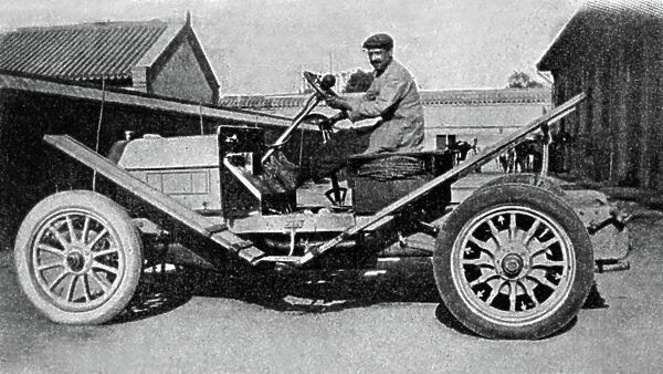 The Peking to Paris motor race 1907 : here Ettore Guizzardi, mechanic of prince Scipion Borghese, drivin Itala car just before departure on june 10, 1907